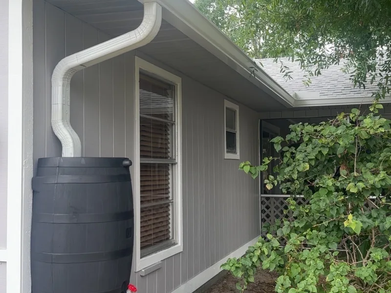 Seamless gutters on a dark exterior — Quality Over Quantity Gutters, Cape Coral, FL